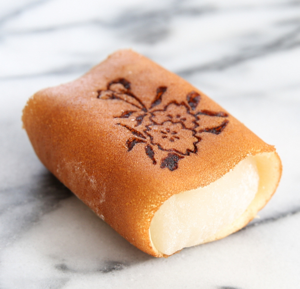 photo of mochi stamped with a floral design