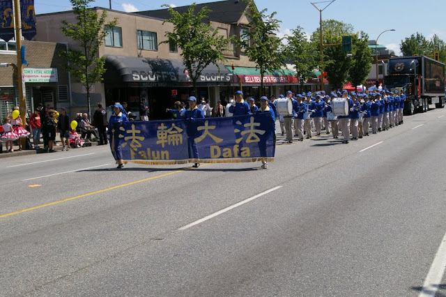 I think some of their beliefs are homophobic, racist and fucked up but I'll be damned, the Falun Dafa people had a wonderful brass marching band. I look forward to seeing them again at the next parade!