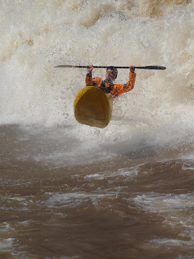 Surfing the middle wave at the dries requires you to be out of control and in the air 40% of the time. This is me hoping I land without incident. Photo: Kirk