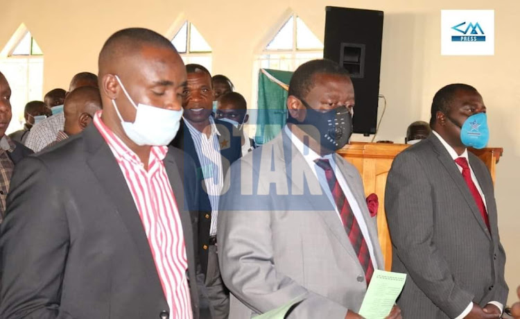 Kakamega Senator Cleophas Malala, ANC leader Musalia Mudavadi and Lurambi MP Bishop Titus Khamala at Maraba ACK Church on Sunday.