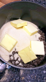 Chocolate chips, butter, sugar, ready for the water and to melt away into chocolatey goodness for my recipe of Potato Chip Brownies (or just Brownies in general)