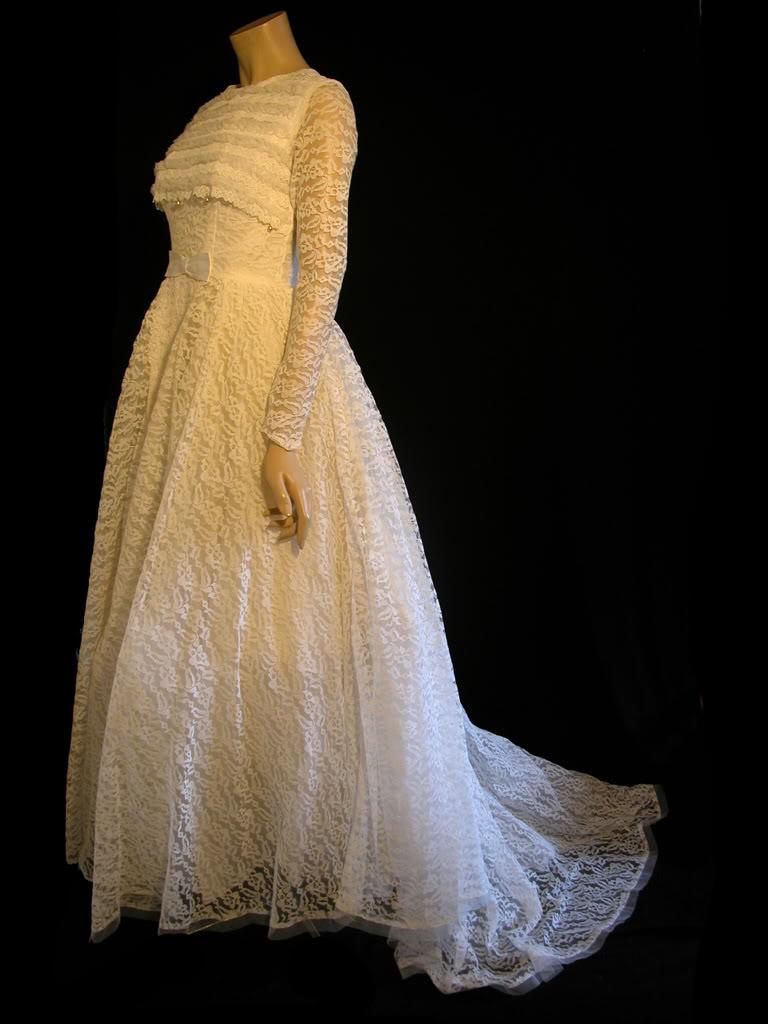 80 . 1960s lacy wedding dress