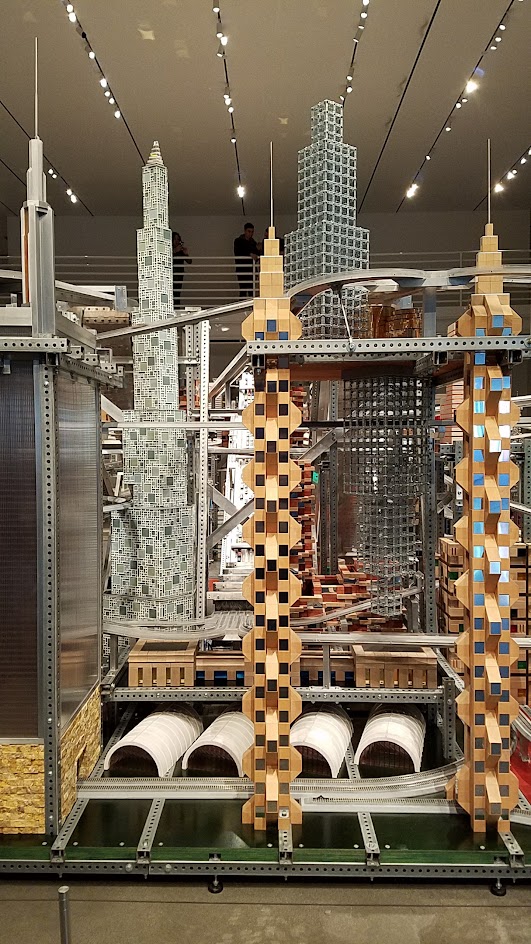 If you buy your LACMA museum admission, there is another Chris Burden exhibit you can view inside one of the building Broad Contemporary Art Museum. This is Metropolis II, also a sculpture but a kinetic one. Some of the times, it is a mini city, frozen in time with a lot of Hot Wheel Cars and Miniature trains on bridges and roads throughout the multiple levels.