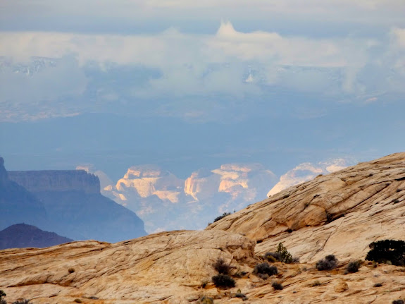 Capitol Reef spotlighting with Boulder Mountain in the distance