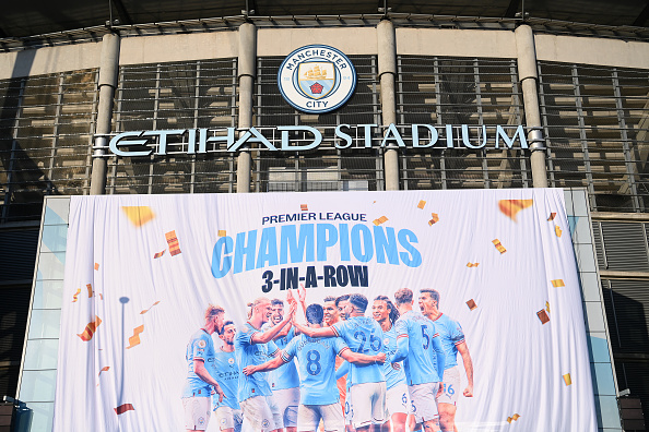 'Premier League Champions' banner is revealed outside the Etihad Stadium after Manchester City were confirmed as 2022/23 Premier League champions after Nottingham Forest beat Arsenal.