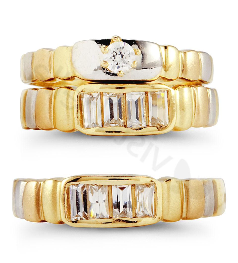 Choose three! This wedding set features three rings, a wedding ring for him