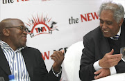 A file photo of Vuyo Mvoko, taken in July 2010, and former minister in the presidency, Essop Pahad. 