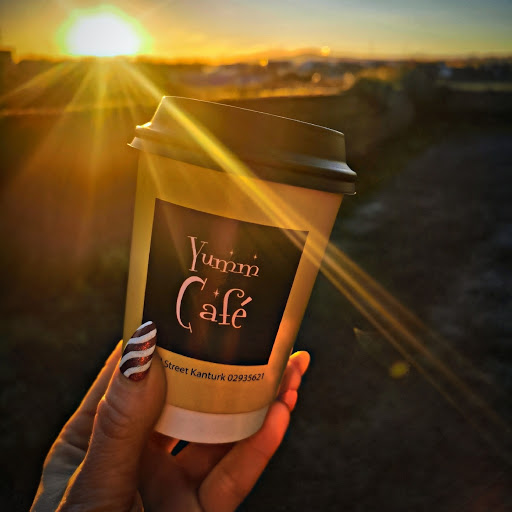 Yumm Cafe logo