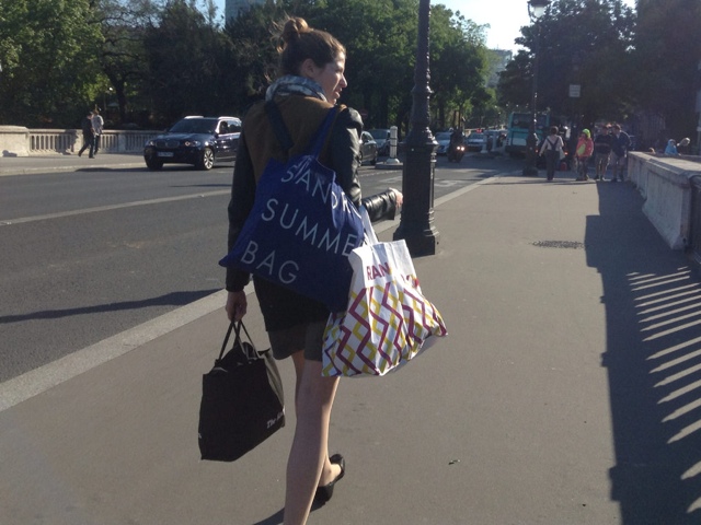 Young Parisian crossing a bridge