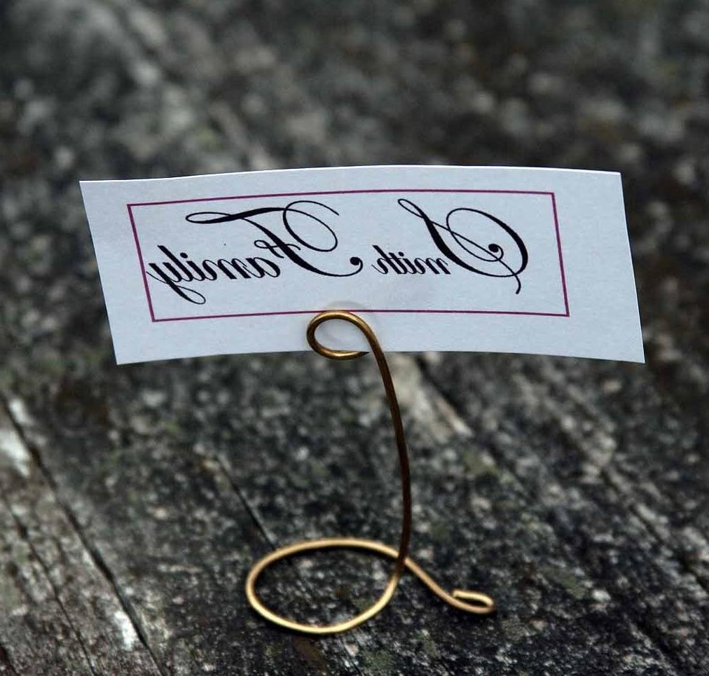 Mini brass place card holders for your big day. Sturdy table markers to hold