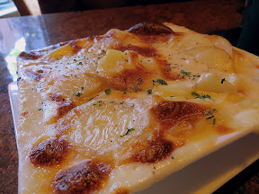 Urban Fondue, Portland, fondue restaurant, side dish of Gratin yukon potatoes with Parmesan, black pepper and Gruyere cheese