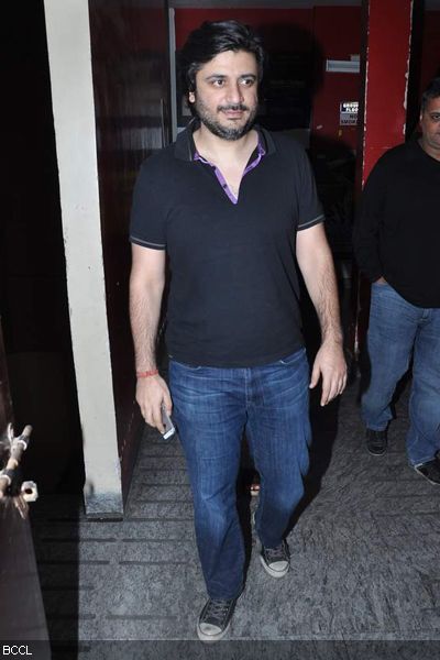 Goldie Behl sans wife Sonali Bendre caught during the premiere of the movie 'David', held in Mumbai on January 31, 2013. (Pic: Viral Bhayani)<br /> 