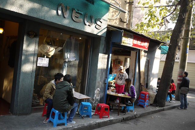 plastic stools outside at snack shop in Changsha, China