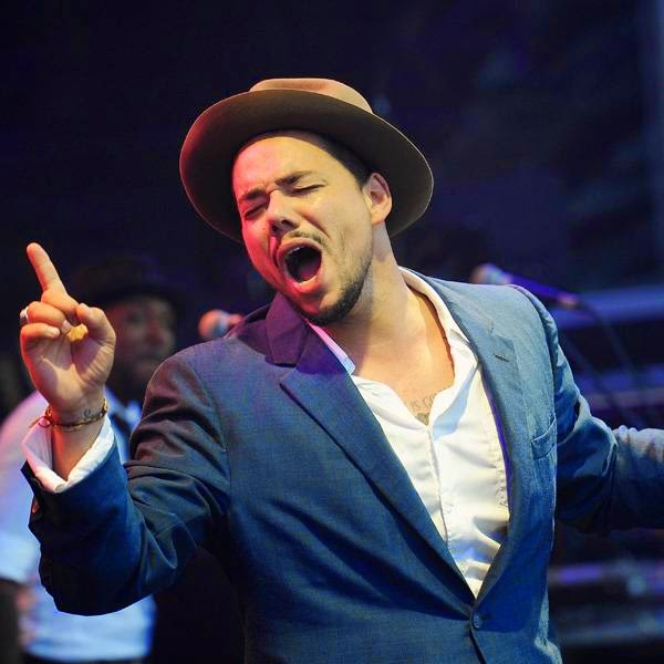 French singer Benjamin Duterde, aka Ben L'Oncle Soul, performs on July 11, 2014 on the main stage of the Francofolies music festival in La Rochelle, western France.