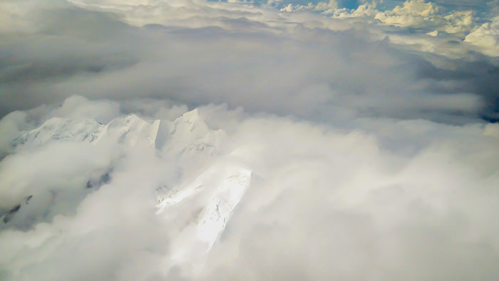 The aerial view of the Mount Illamani from the flight while flying out of La paz on a plane from La Paz to Santa Cruz