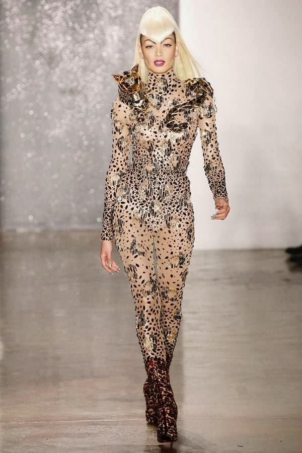 A model walks the runway at the The Blonds fashion show during Fall 2014 MADE Fashion Week Fall 2014 at Milk Studios on February 12, 2014 in New York City.