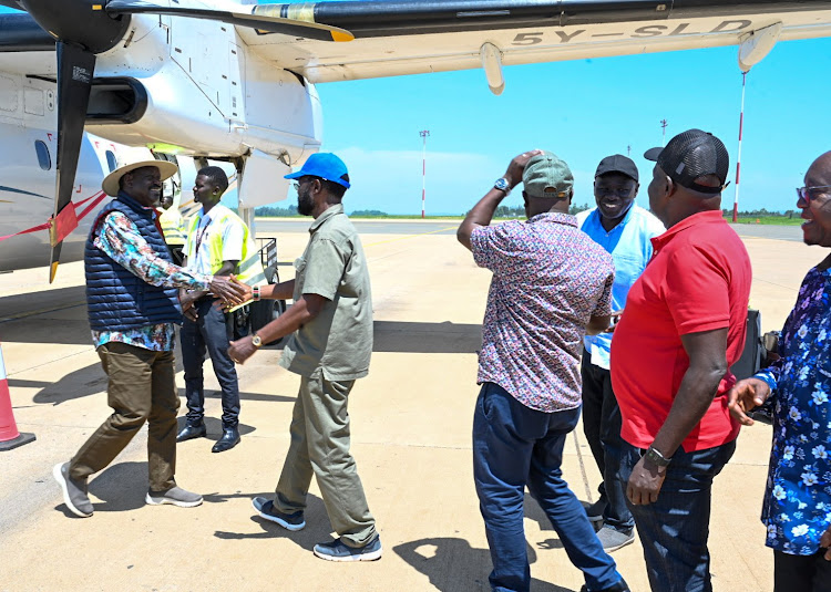 Azimio leader Raila Odinga at Kisumu International Airport where he was received by Kisumu Governor Anyang Nyong'o among other leaders from the county.
