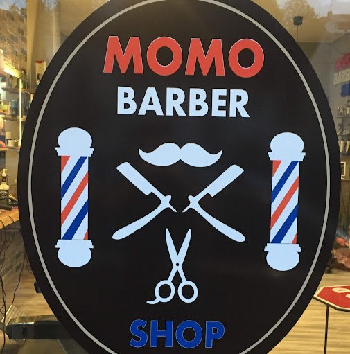 Momo Barber Shop logo