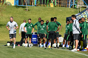 South Africa head coach Stuart Baxter speaks to the players during the South African national men's soccer team training session at Steyn City School on June 05, 2019 in Johannesburg, South Africa. 