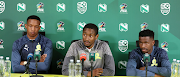 Head coach of Mamelodi Sundowns coach Rulani Mokowena flanked by defenders Grant Kekana and Terrence Mashego.