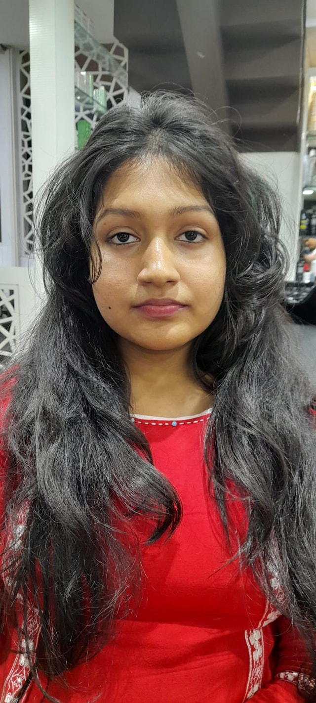 Red dressed girl's mid back length layer hair style makeover - Village ...