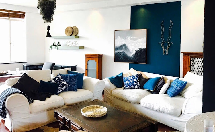 Decor stylist Karin Orzol gave this living room a fresh look and feel by rearranging the furniture, adding a few new accessories and painting the walls.