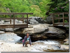 Tricia enjoying the rocks of Second Falls at Graveyard Fields