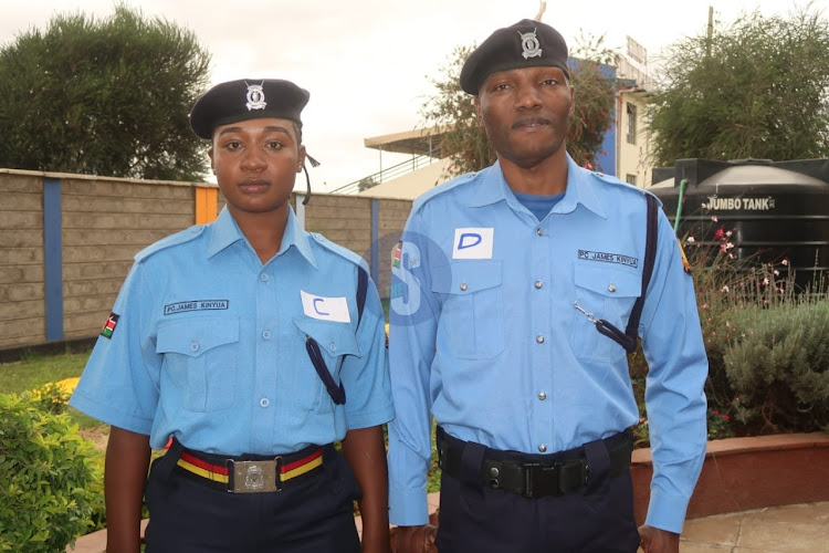 Kenya Police officers Edith Nyanchama and John Kenga poses with the new proposed uniforms at South C, Nairobi Police Pavilion on August 29,2023