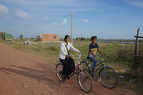 girl and boy riding bikes