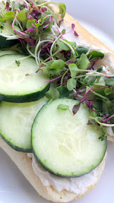 Homemade ricotta on Franz Bakery Stadium Rolls with sliced cucumber and microgreens. Simple sandwich and great for a summer heatwave meal