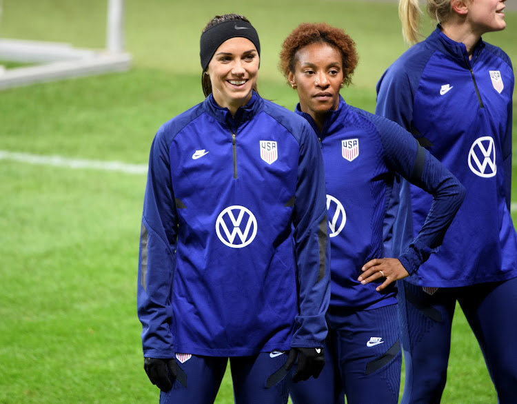 Alex Morgan and Crystal Dunn of the United States during a training session.