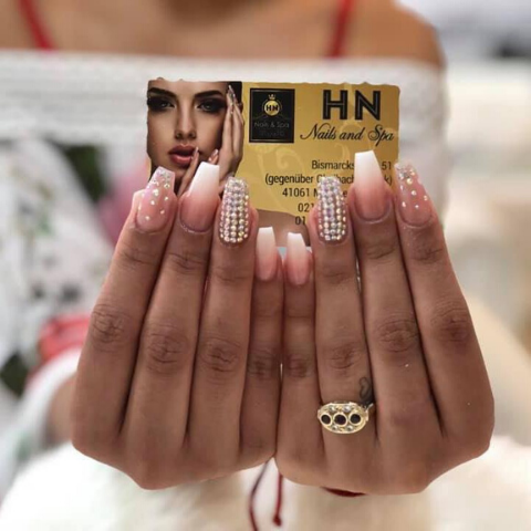 HN Nails and Spa logo