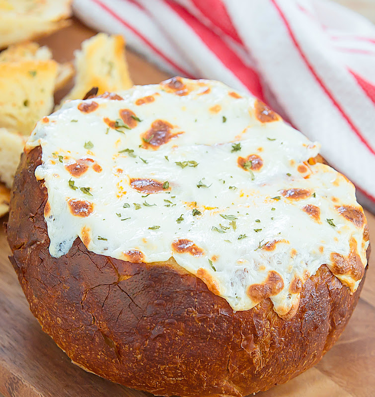 close-up photo of lasagna garlic bread bowl dip 