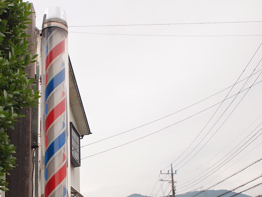 [写真]おなじみトリコロールの回転看板も見納め