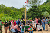 HMI Komisariat FKIP USK Kibarkan Bendera Merah Putih di Lhok Mata Ie