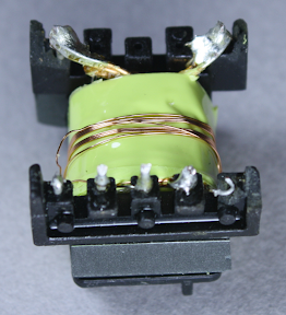 The first winding in the flyback transformer powers the internal circuits of the charger