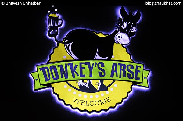 Sign board of Donkey's Arse at Koregaon Park in Pune