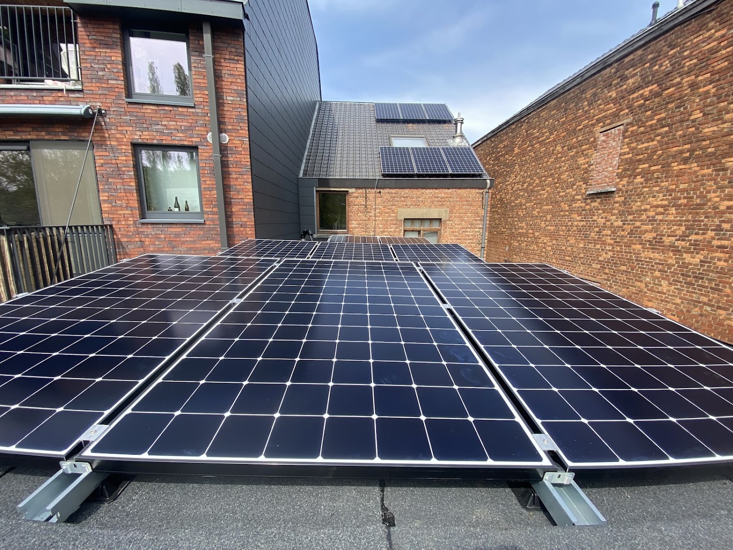 Sunpower,Aarschot,rijwoning,alleenstaande woning,pannendak,plat dak,leien dak,hellend dak,bevestiging,Solaredge,Sunpower MAX3