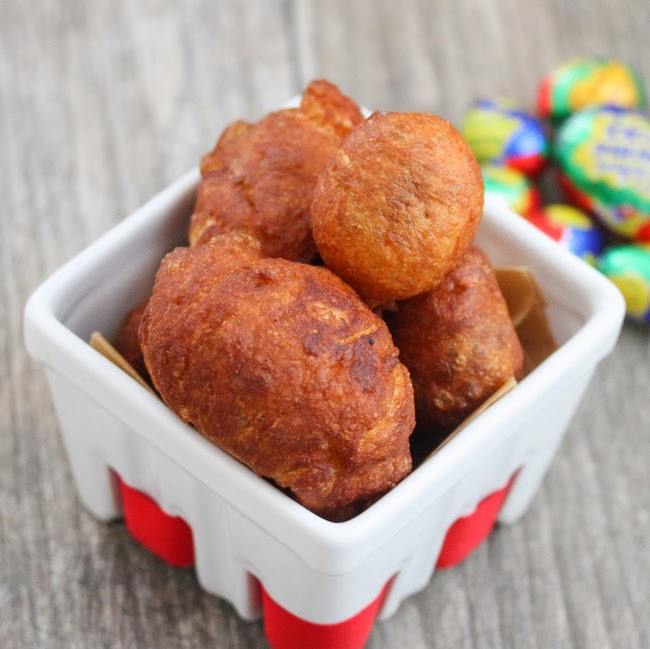 close-up photo of fried cadbury eggs in a basket