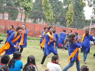 Participants in action during a street play competition at FMS, Delhi.