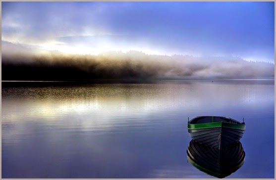 boat-on-misty-lake-316878