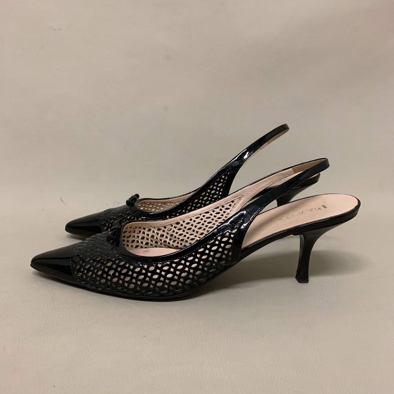 Prada Laser Cut Slingbacks