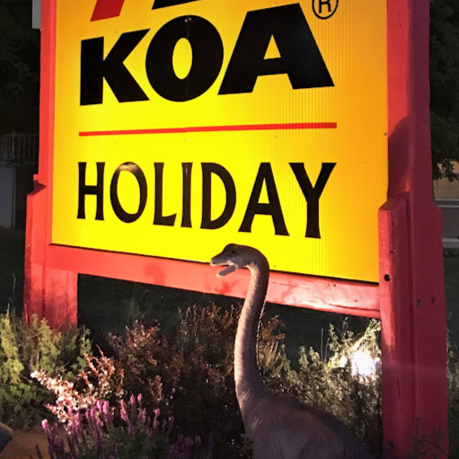 Vernal / Dinosaurland KOA Holiday logo