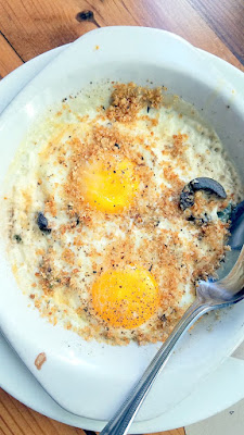 Lincoln Restaurant, Happy Hour item of Baked Eggs with cream, olives, herbed breadcrumbs