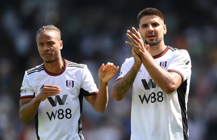 Aleksandar Mitrovic of Fulham acknowledges the fans after the Premier League match against Liverpool at Craven Cottage on August 06 in London.