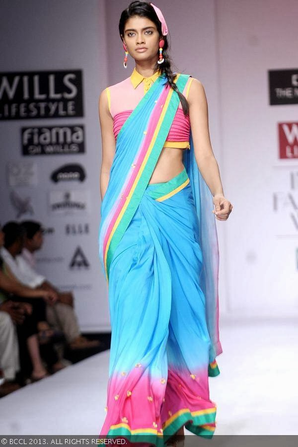 Archana walks the ramp for fashion designer Shantanu Singh on Day 4 of Wills Lifestyle India Fashion Week (WIFW) Spring/Summer 2014, held in Delhi.