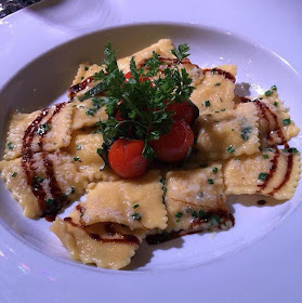 Red Scooter Entree was spinach and feta ravioli with cherry tomatoes 