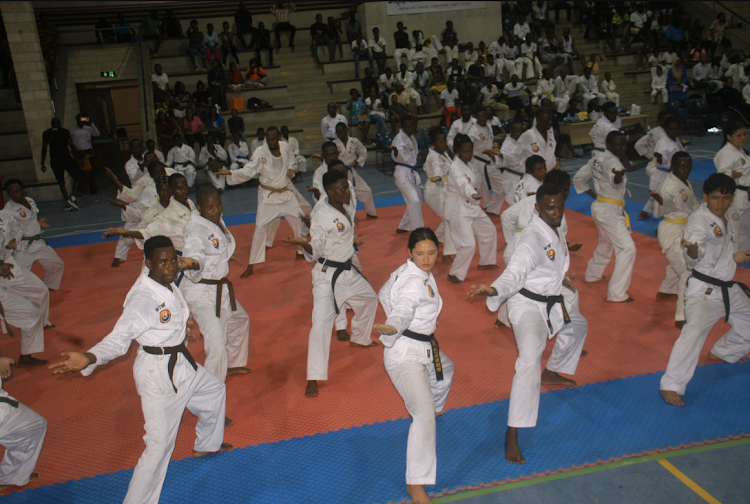 Teams displaying tier abilities in various categories at the opening event at Agakhan academy.