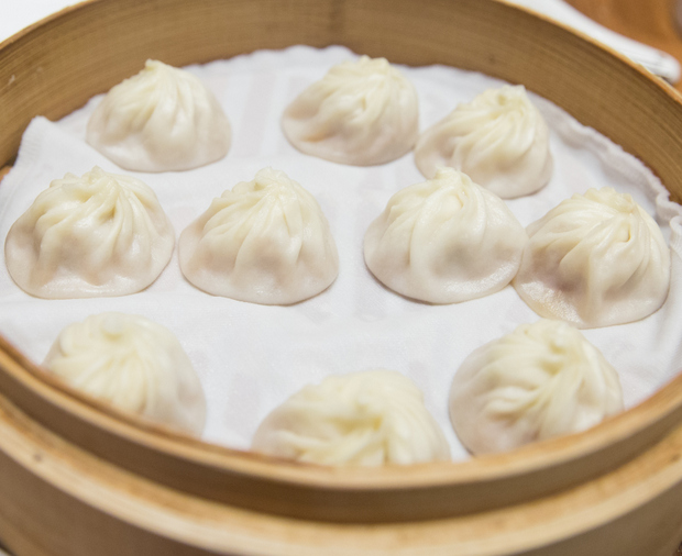 photo of Pork Xiao Long Bao in a bamboo steamer