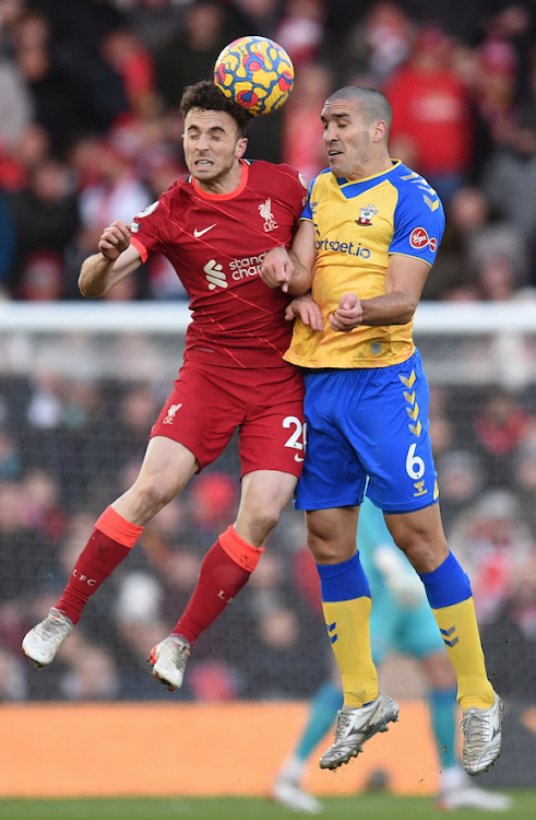 Liverpool striker Diogo Jota (L) vies for the ball with Southampton's Oriol Romeu (R) vies during the English Premier League football match.